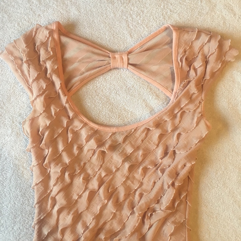 Backless pink ruffle-layered dress